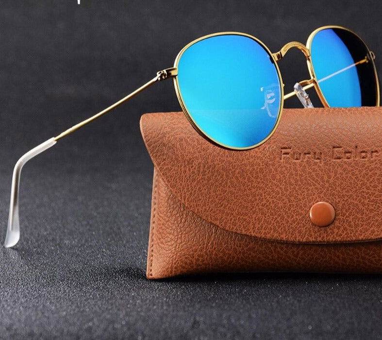 Sunglass Lover steampunk round sunglasses with thin gold frame blue mirrored lenses and brown leather case
