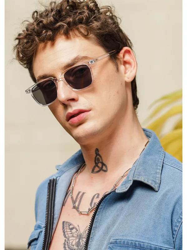 Male model wearing Sunglass Lover clear black wayfarer sunglasses with clear frames dark lenses denim jacket