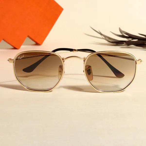 Sunglass Lover Hexa brown gradient sunglasses. Gold metal hexagonal frame with brown gradient lenses and black temple tips