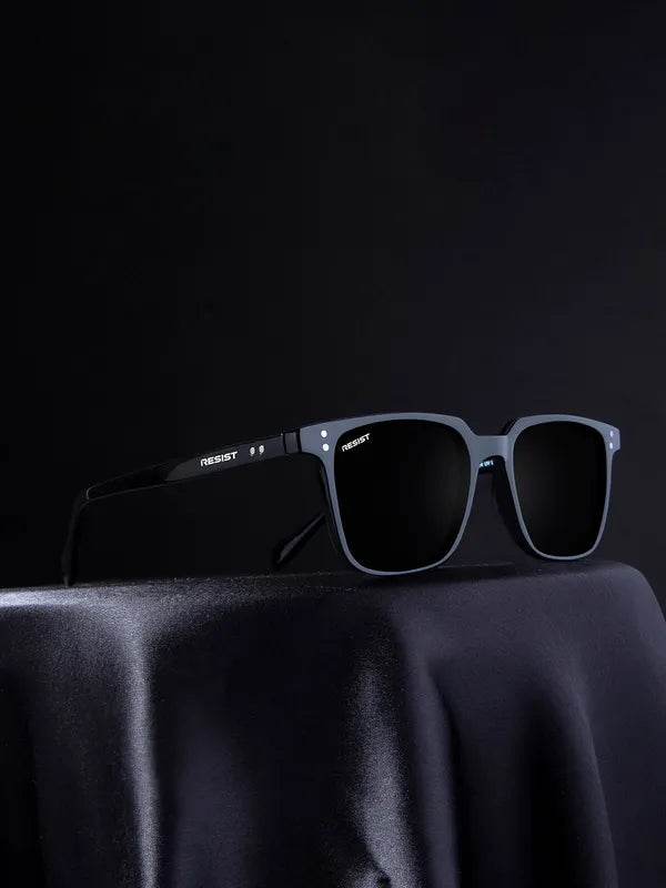 Sunglass Lover small black rectangle sunglasses with polarized lenses and matte frame on dark display