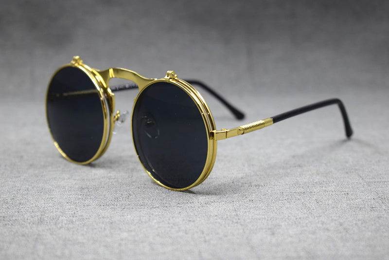 Sunglass Lover gold round flip up sunglasses with black lenses and retro steampunk frame for sun protection