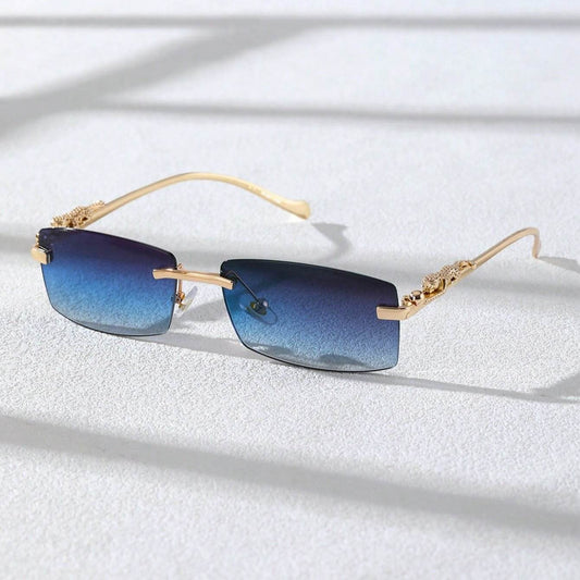 Sunglass Lover rimless rectangle sunglasses with blue gradient lenses and decorative gold filigree temples
