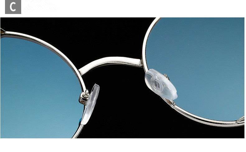 Sunglass Lover retro round sunglasses India close up silver metal frame blue lenses with adjustable nose pads