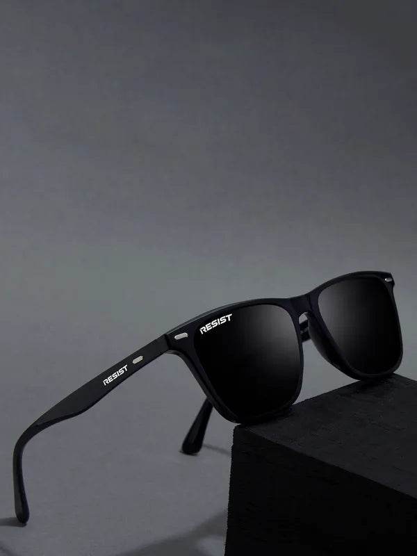 Sunglass Lover black square sunglasses with matte frame and dark lenses on gray backdrop UV protection oval square sunglasses
