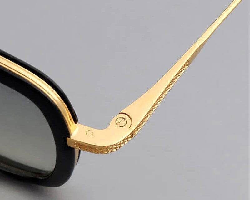 Sunglass Lover gradient double bridge square sunglasses close up of gold textured temple hinge and black frame