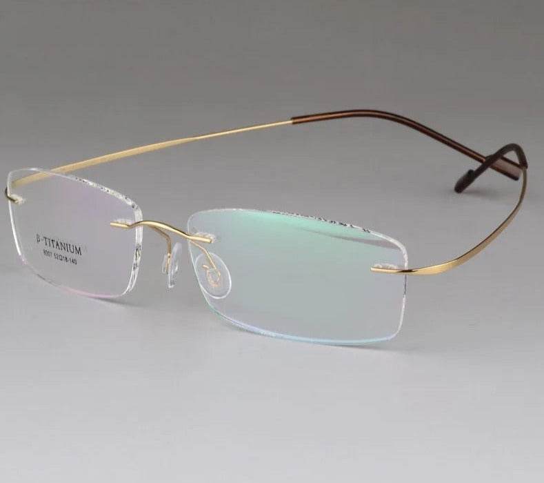 Sunglass Lover titanium rimless optical frame with gold temples and brown tips lightweight rectangular lenses