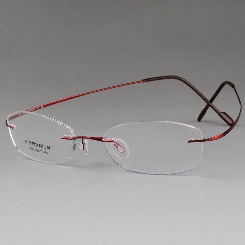 Sunglass Lover titanium rimless optical frame with rectangular clear lenses and red titanium temples