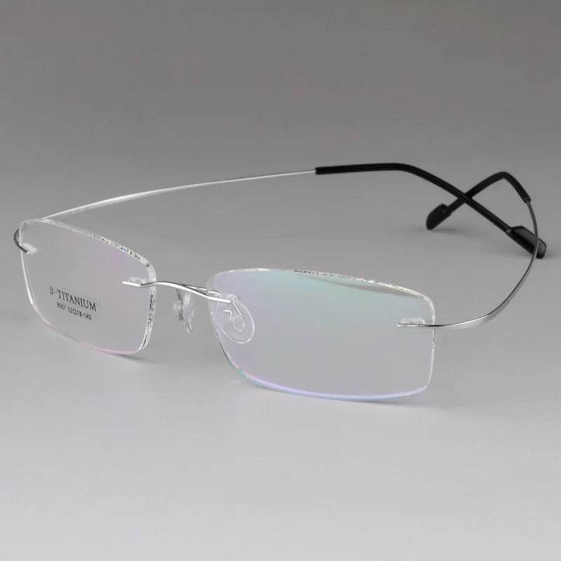 Sunglass Lover titanium rimless optical frame with rectangular clear lenses silver temples and black tips