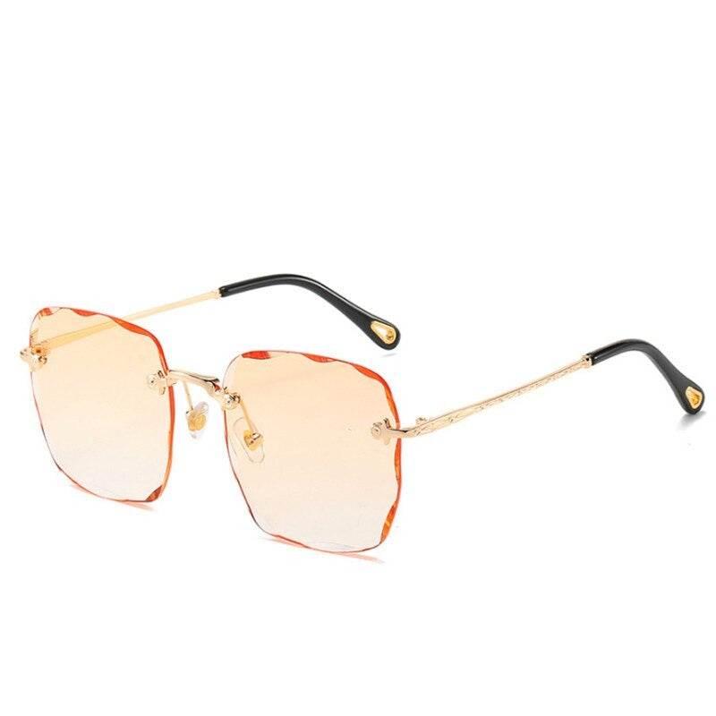 Sunglass Lover rimless oversize square sunglasses with gold temples and orange gradient lenses