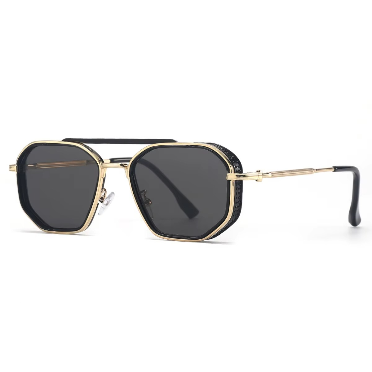 Sunglasses with golden frame and black lenses on a white background