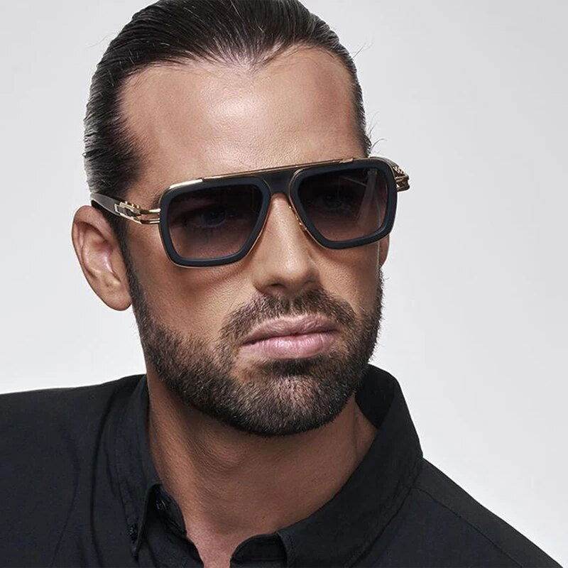 Sunglass Lover male model wearing black gold frame trendy pilot sunglasses with UV protection and gradient lenses