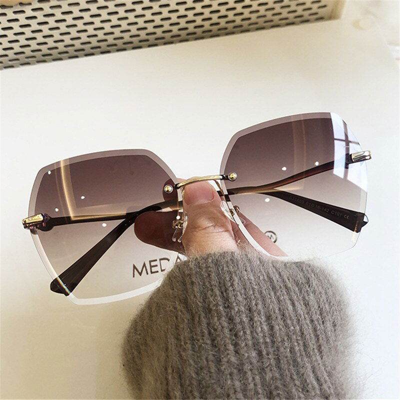 Sunglass Lover oversized rimless sunglasses for women with brown gradient geometric lenses and gold bridge