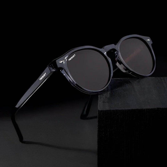 Sunglass Lover men's brown oval shades with translucent dark frames and UV protective lenses