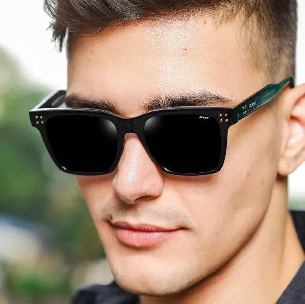 Sunglass Lover black square sunglasses for men on model with matte black frame and polarized lenses