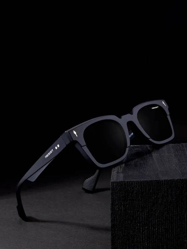 Sunglass Lover black square sunglasses for men matte frame dark lenses silver rivet temple logo studio display