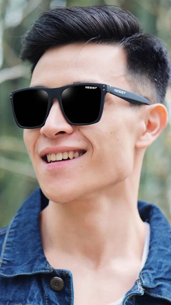 Young man wearing Sunglass Lover black wayfarer sunglasses for men square frames casual outdoor style