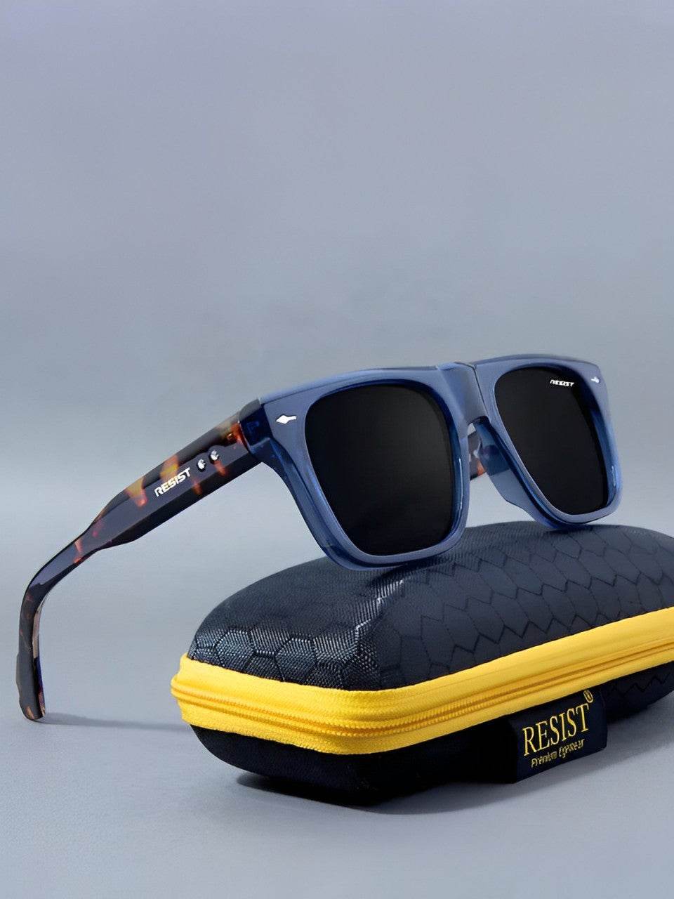 Sunglass Lover crystal blue wayfarer sunglasses square frame on navy textured case with yellow zipper