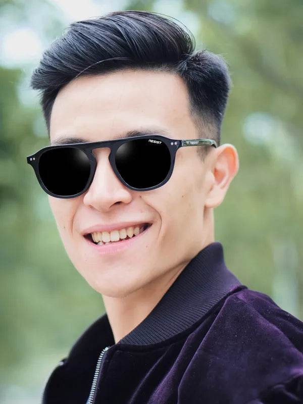 Sunglass Lover oval double bridge black sunglasses worn by smiling man outdoors for casual sun protection