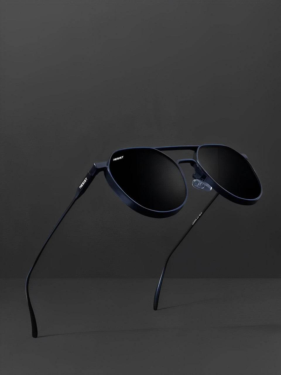 Sunglass Lover oval double bridge black sunglasses with dark lenses and slim metal temples on gray background