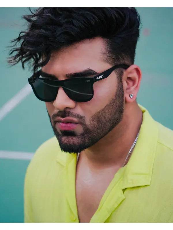 Sunglass Lover polarized wayfarer sunglasses black frame on bearded man wearing lime shirt outdoors