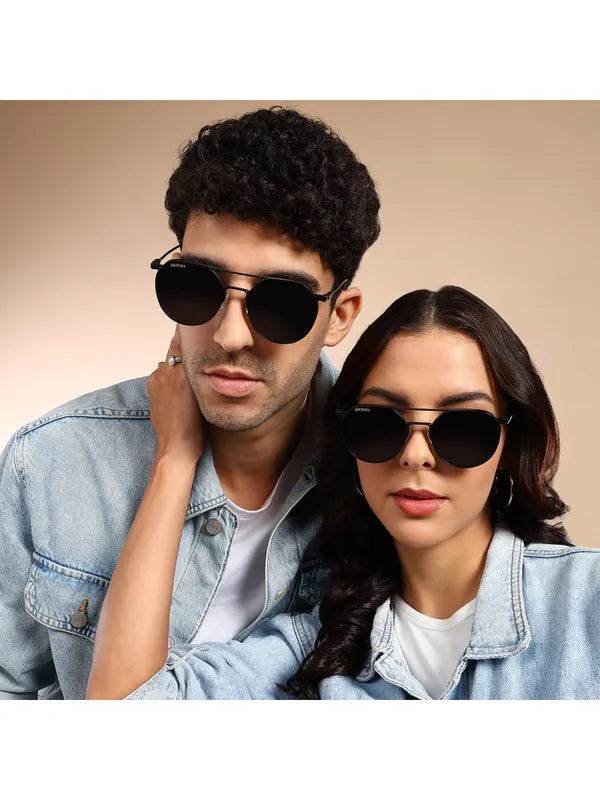 Sunglass Lover models wearing Stevan black oval glasses paired with denim jackets in studio