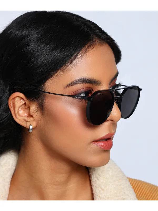 Sunglass Lover Stevan black oval glasses worn by model with thin black metal frame and dark lenses