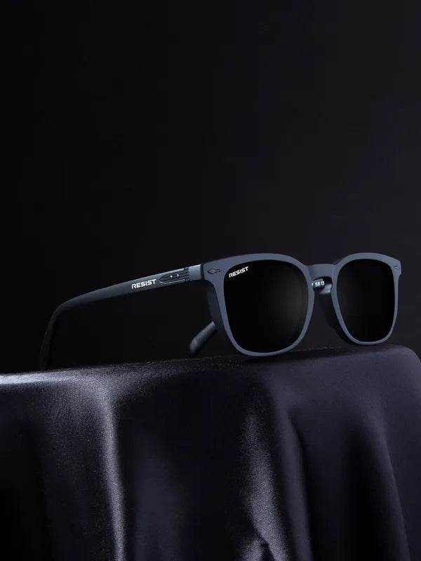 Sunglass Lover matte black wayfarer sunglasses on draped fabric studio display UV protected wayfarer sunglasses