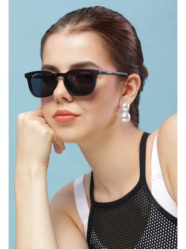 Sunglass Lover model wearing UV protected wayfarer sunglasses black frames with dark lenses and pearl earrings