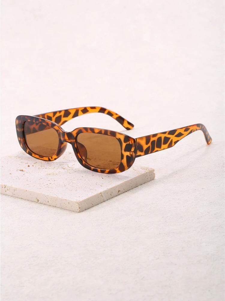 Jimmy Rectangle sunglasses tortoiseshell patterned rectangular frame with brown lenses on light textured background