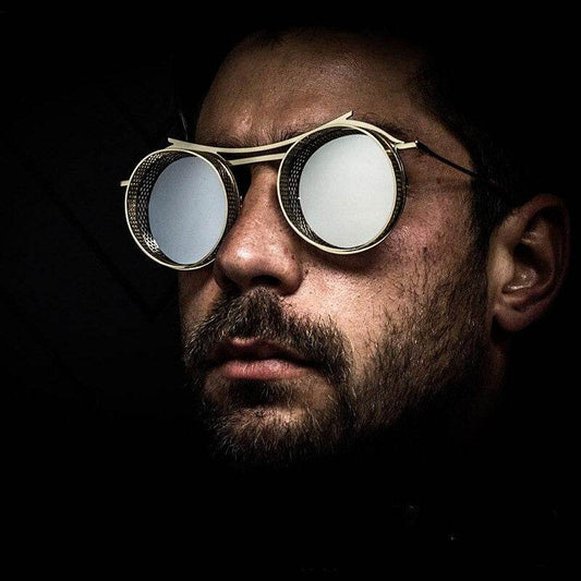 Sunglass Lover round steampunk sunglasses on a bearded man with mirrored lenses and metal frame