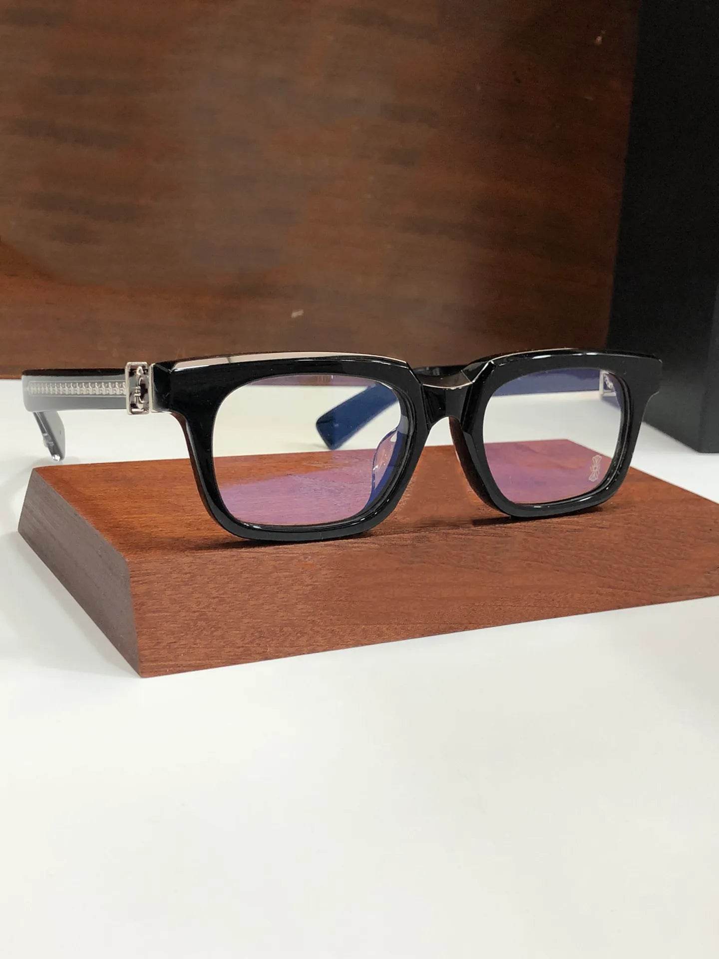 Sunglass Lover retro blue light blocking glasses rectangle black acetate frame on wood stand