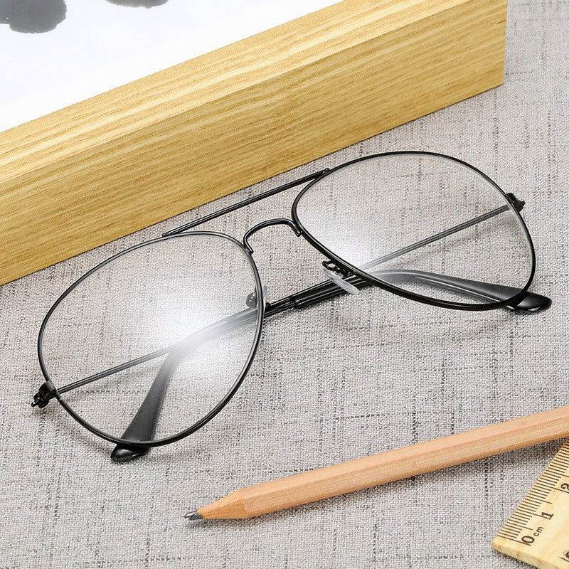 Sunglass Lover aviation metal frame eyeglasses black aviator style on fabric with pencil and ruler