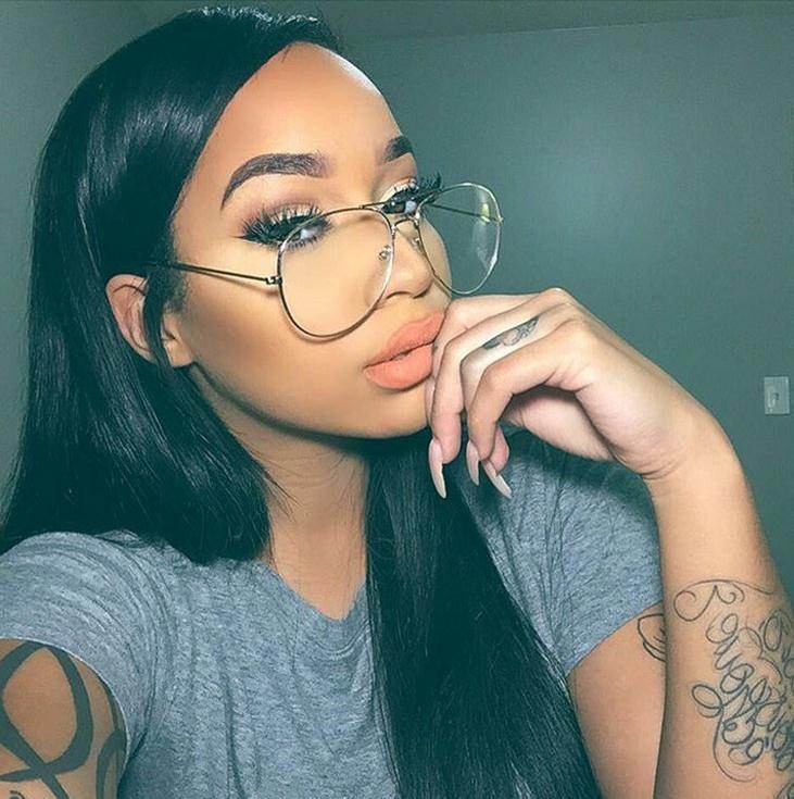 Sunglass Lover model wearing gold aviation metal frame eyeglasses with oversized lenses and thin temples