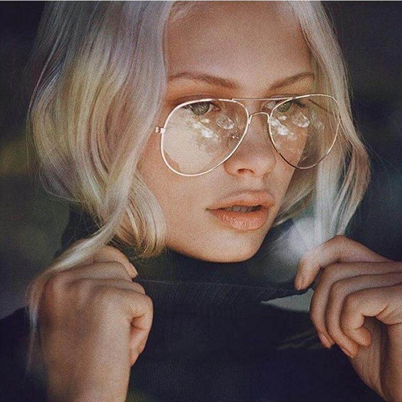 Close up of woman wearing aviation metal frame eyeglasses by Sunglass Lover reflective lenses blonde hair
