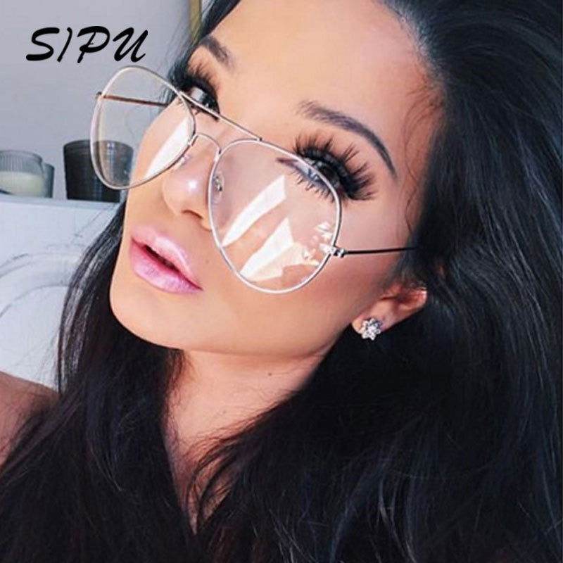 Sunglass Lover aviation metal frame eyeglasses worn by female model large aviator clear lenses