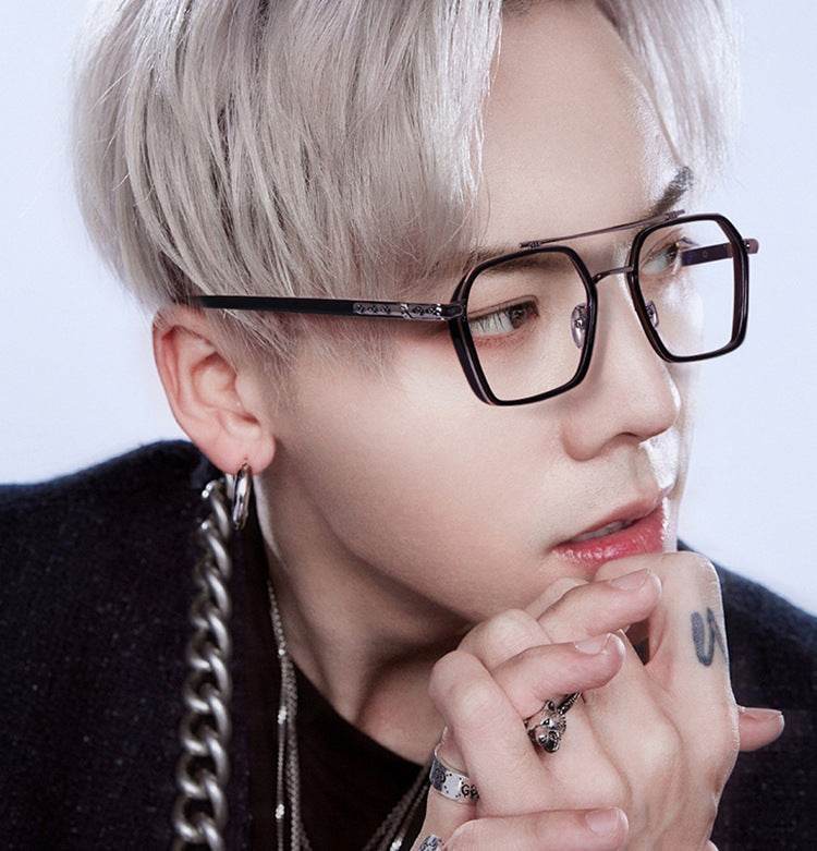 Sunglass Lover oversized square metal eyeglasses frames on model with platinum hair and chain necklace and rings