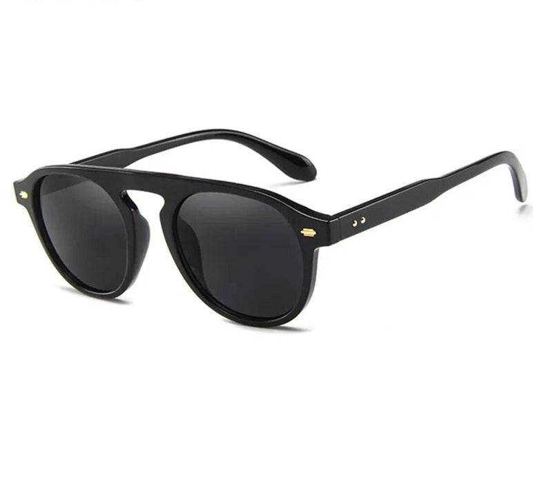 Sunglass Lover black plastic frame retro oval vintage sunglasses with dark lenses and glossy finish