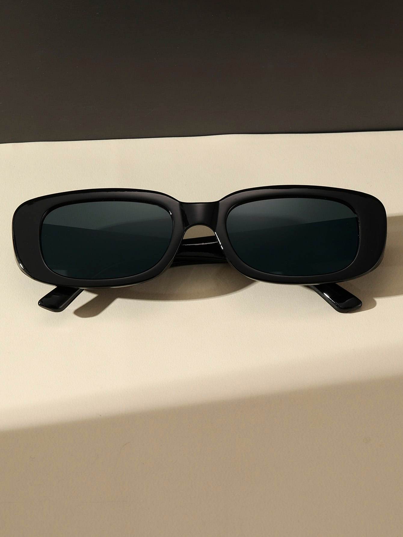 Sunglass Lover black small rectangle sunglasses with glossy rectangular frame and dark lenses