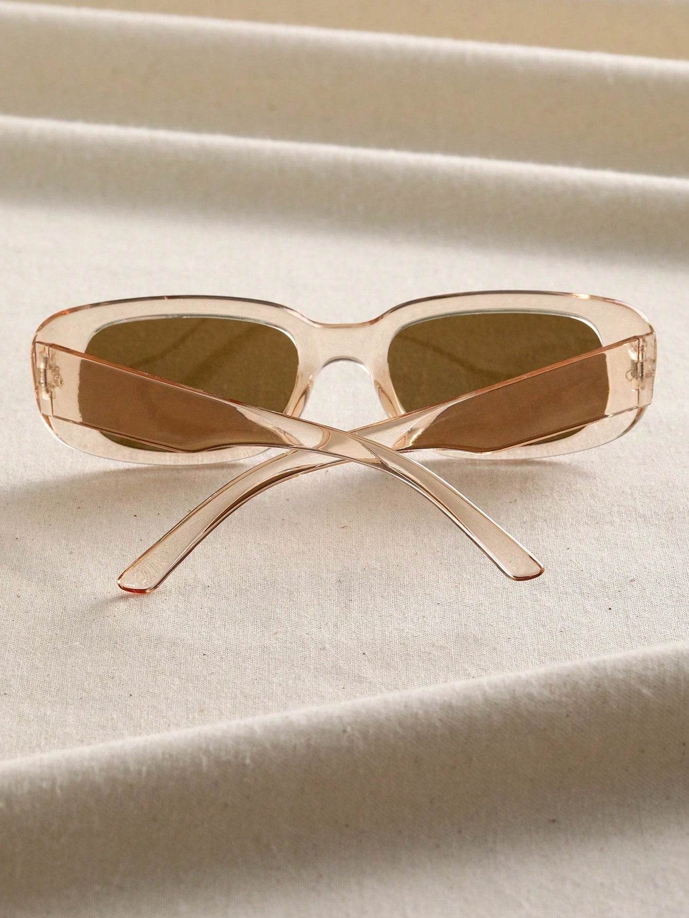 Sunglass Lover small rectangle sunglasses translucent beige frame with brown lenses crossed temples