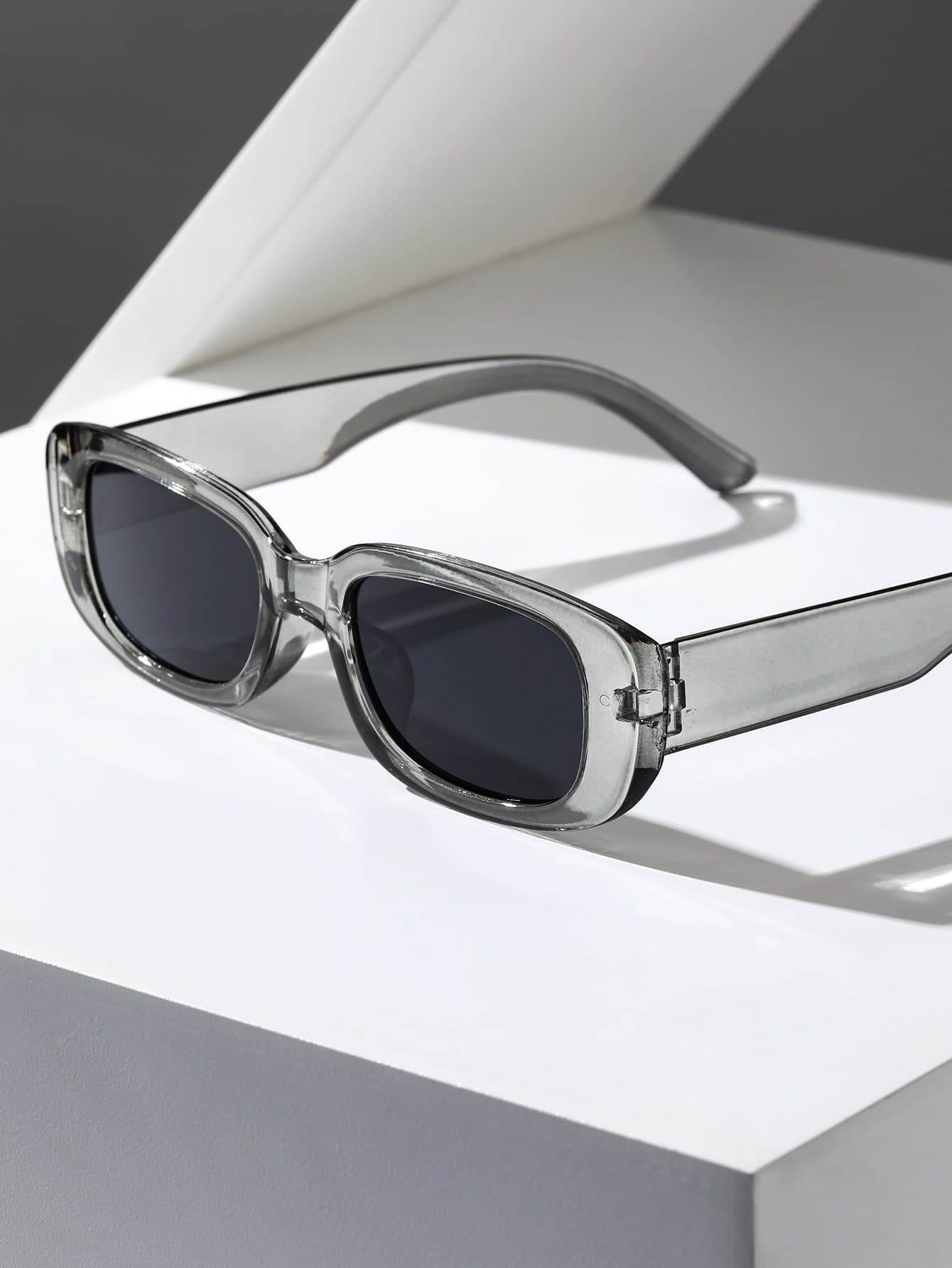 Sunglass Lover small rectangle sunglasses clear gray transparent frames with dark lenses on white display