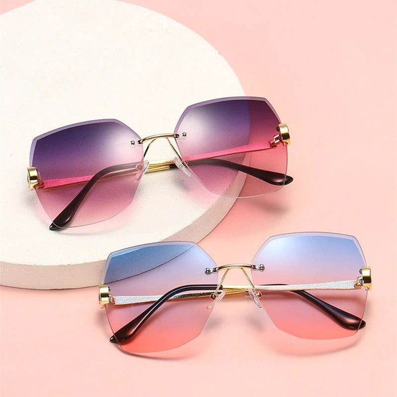 Sunglass Lover ladies rimless sunglasses online pastel gradient lenses with gold bridge two pairs on pink background