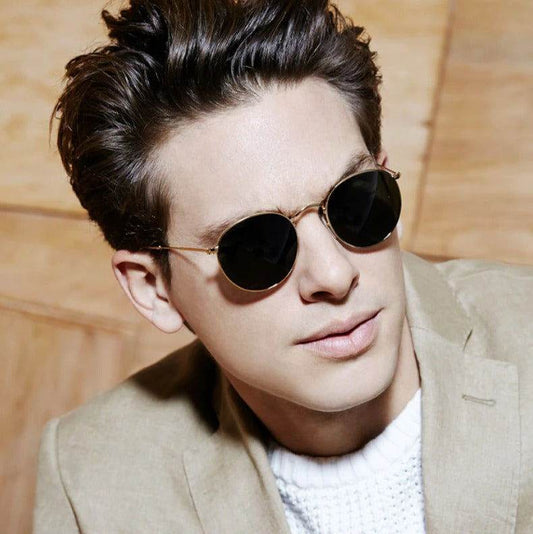Sunglass Lover gold frame round sunglasses for men and women worn by man in beige blazer and white sweater