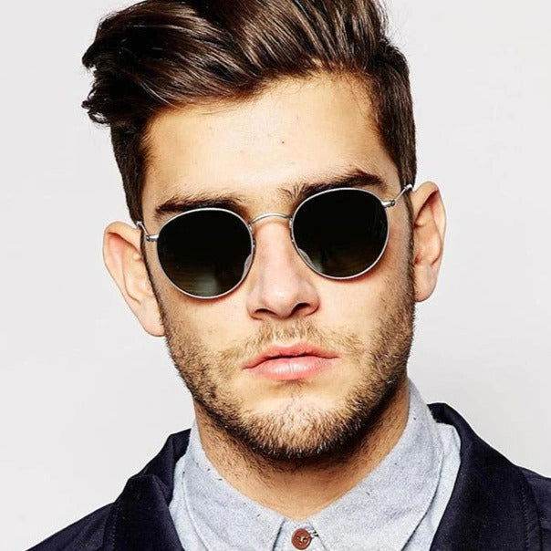 Sunglass Lover round sunglasses for men and women on male model silver metal frame dark lenses