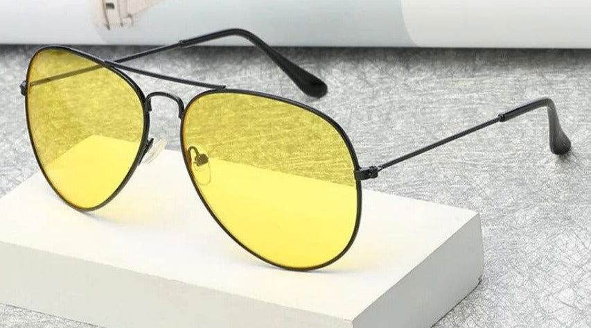 Sunglass Lover pilot polygon unisex sunglasses with yellow lenses and slim black metal aviator frame