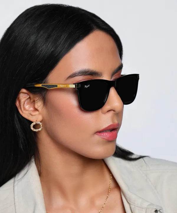 Sunglass Lover unisex wayfarer black sunglasses with gold temples worn by model for everyday wear