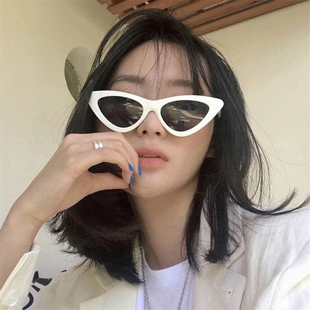 Sunglass Lover white small cat eye sunglasses trendy worn by model with black hair for retro style