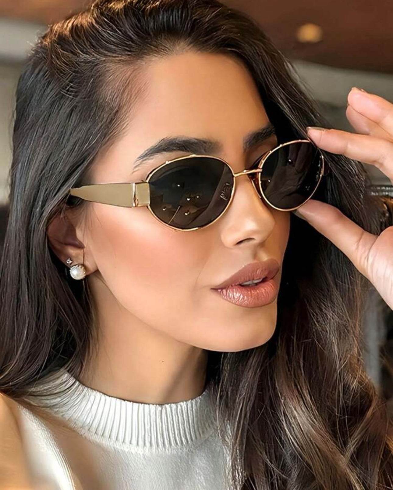 Sunglass Lover gold frame fashion oval sunglasses online India dark lenses on woman close up