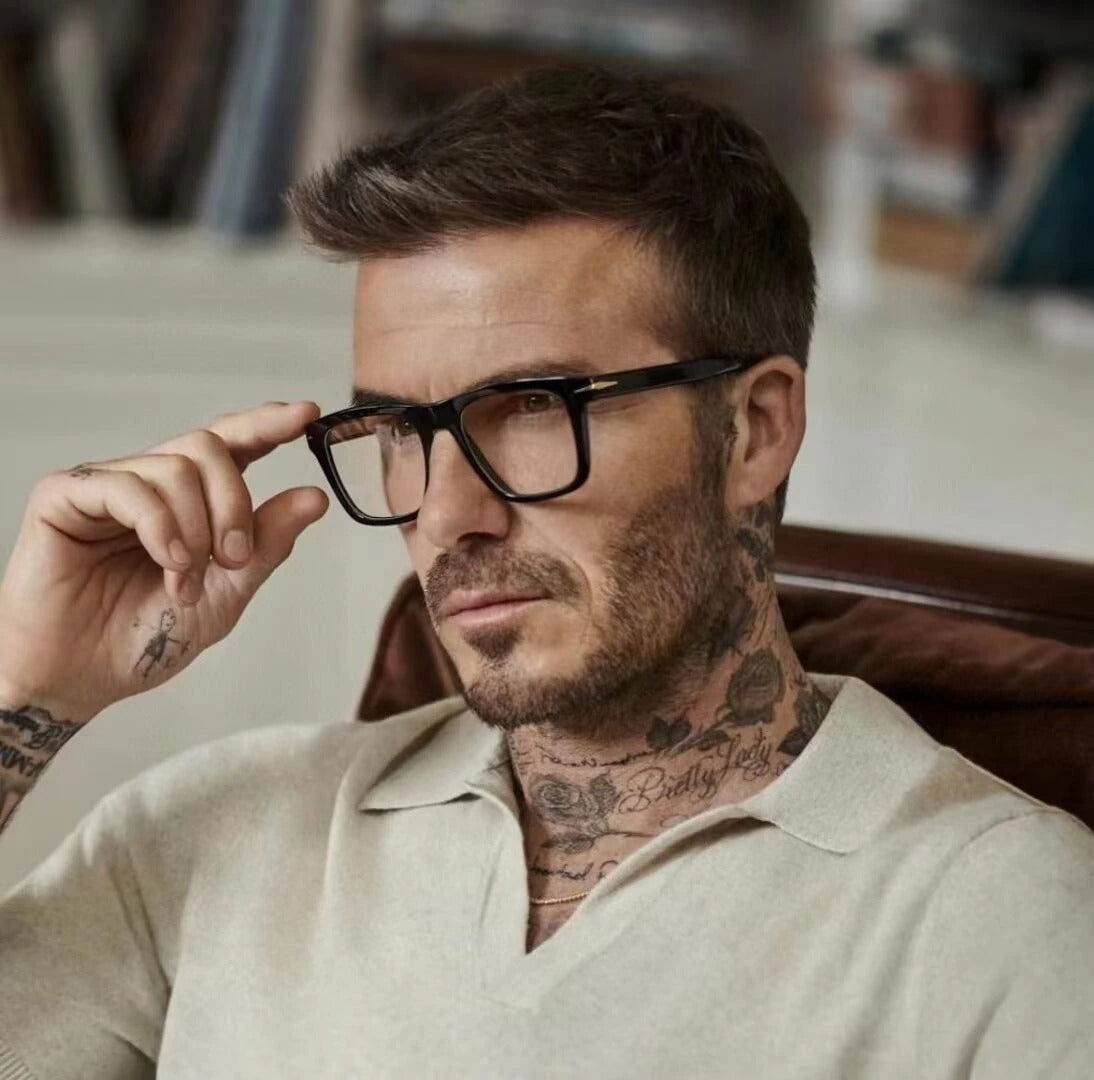 Stylish man wearing black acetate blue light blocking square glasses with clear lenses by Sunglass Lover