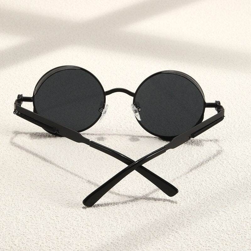 Sunglass Lover black metal steampunk round sunglasses for men with round dark lenses and crossed temples