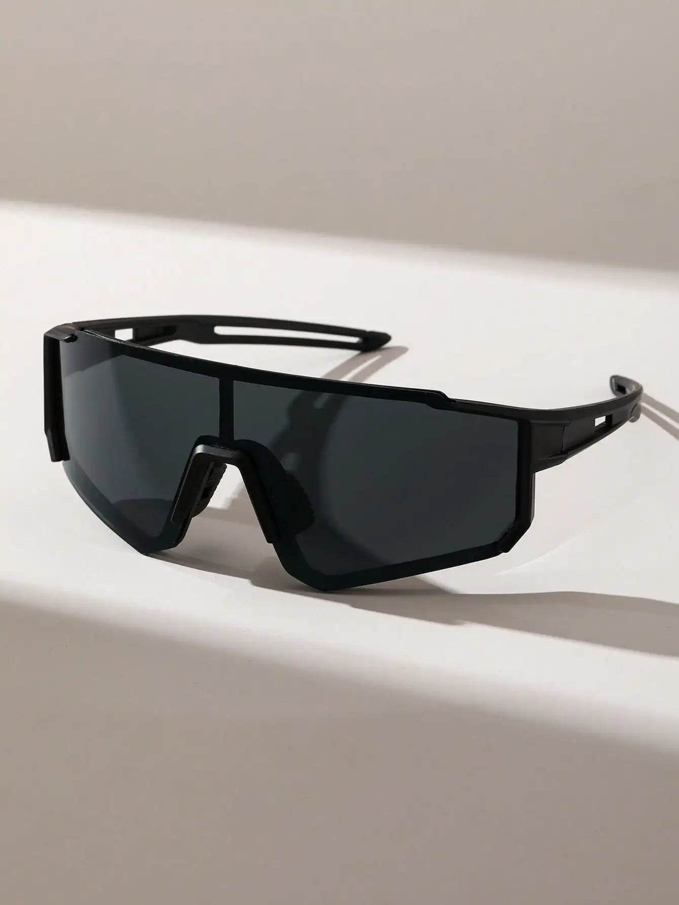 Sunglass Lover black wraparound shield sports sunglasses for men with dark polarized lenses and rubber nose pad